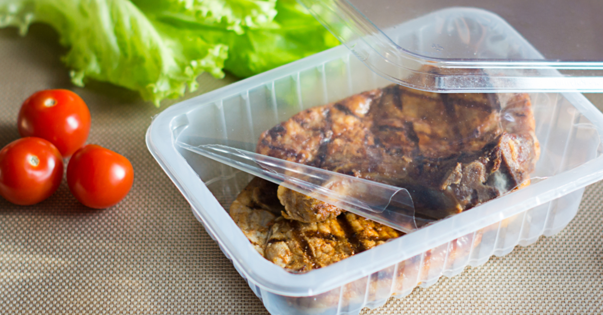 Meat in plastic container with plastic sealing
